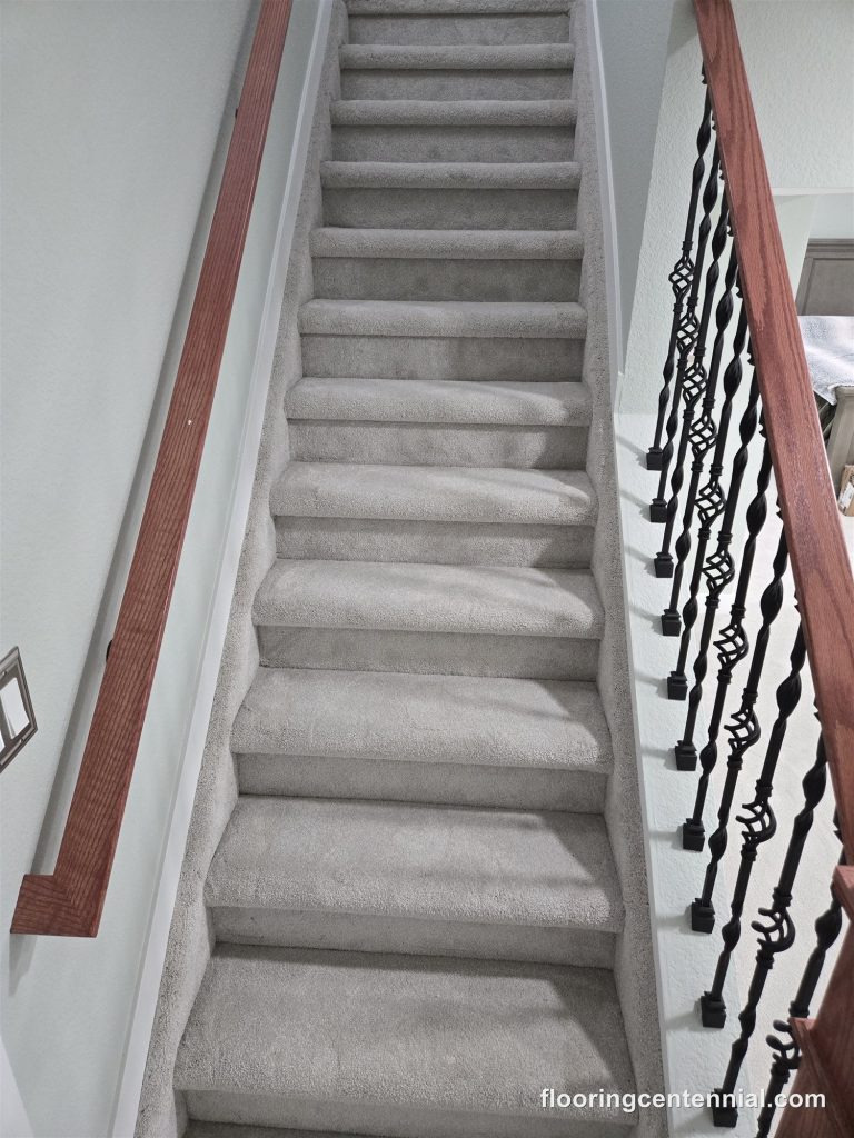 Carpeted staircase with painted railing and new carpet and pad, Aurora CO