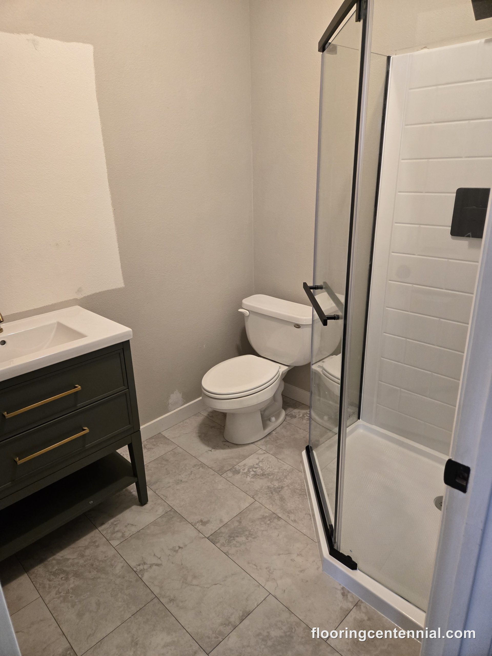 New vanity, toilet reset and fresh walls in a Castle Rock bathroom