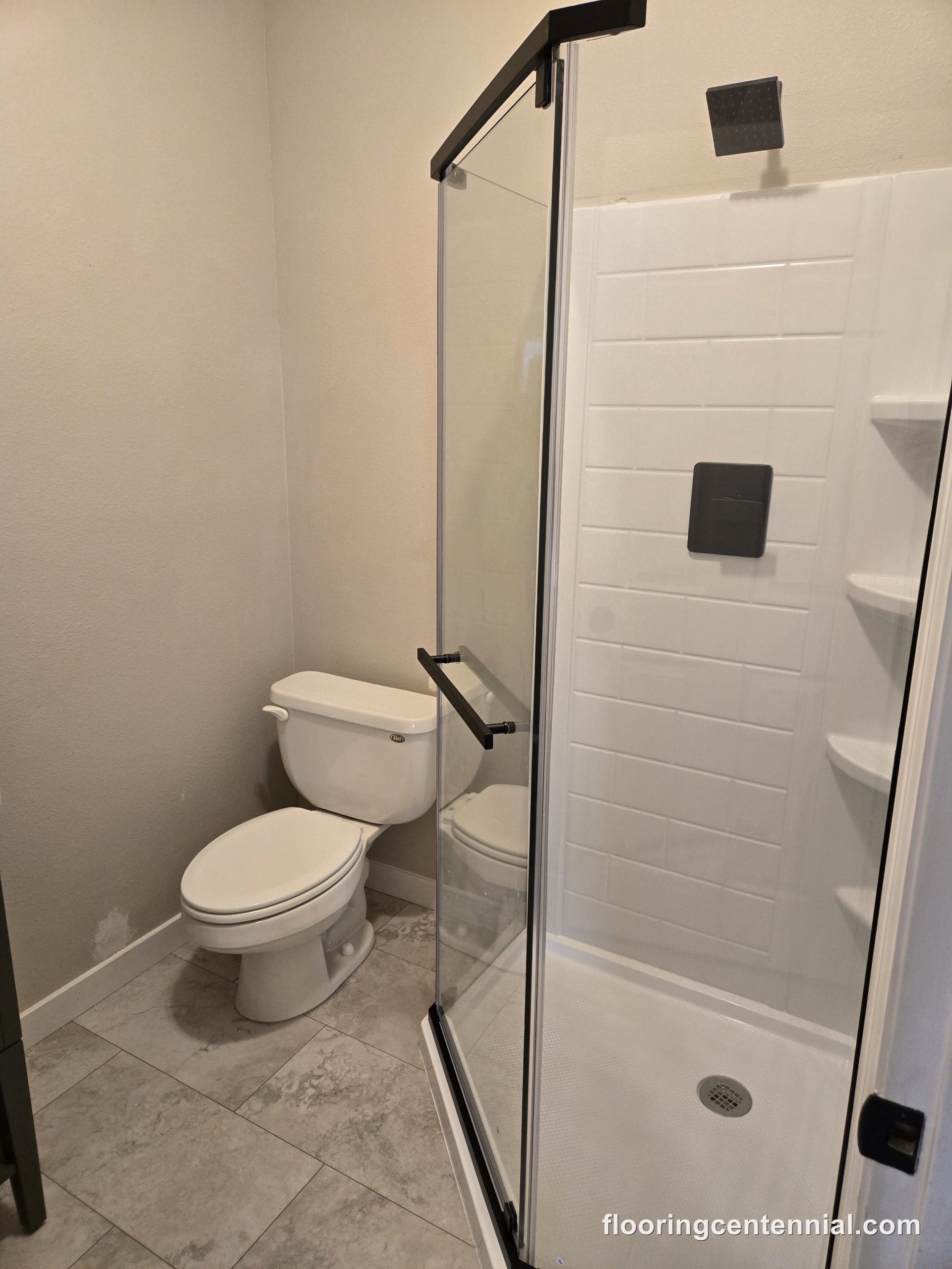 New alcove shower with glass door in a Castle Rock bathroom remodel