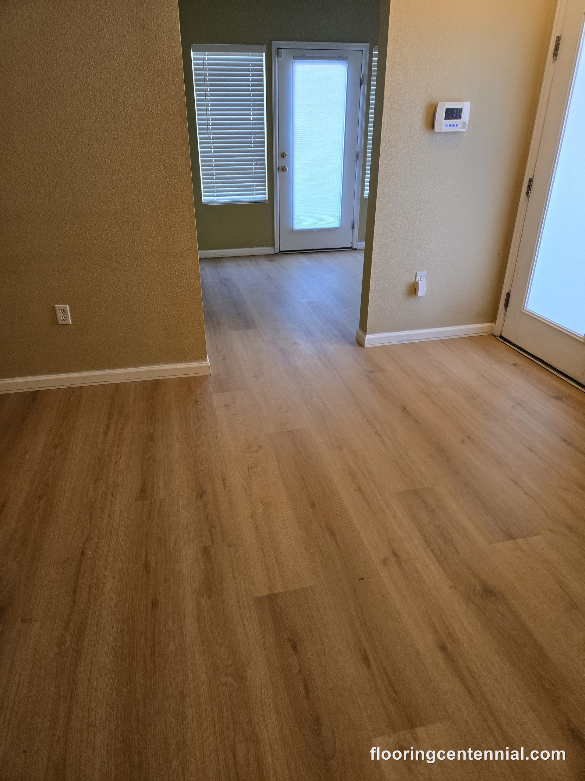 Bright hallway with wood-look vinyl plank flooring