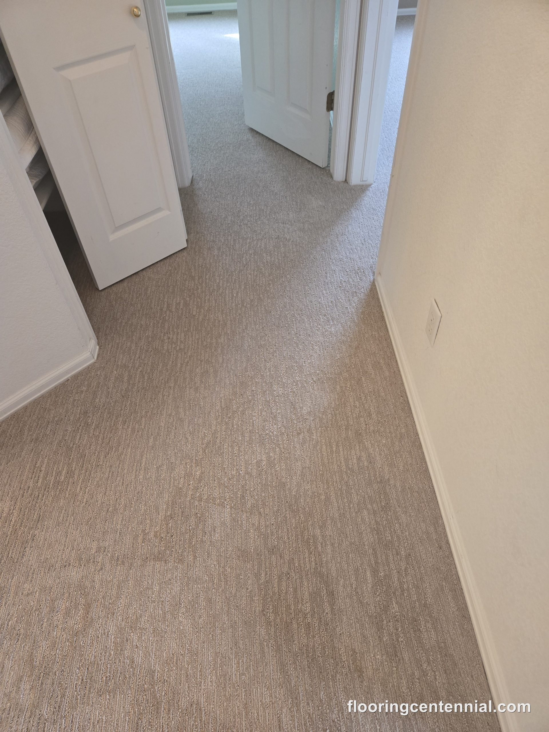 New carpet in a hallway with fresh baseboards, Aurora CO